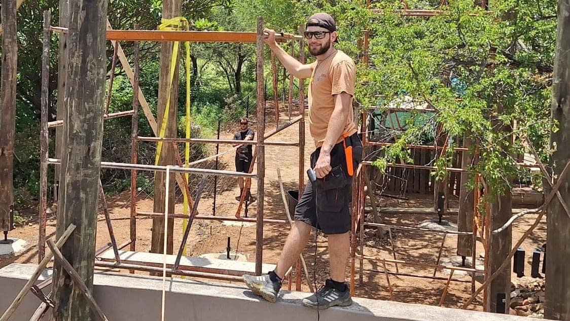 A project participant building the Thandolwami deck